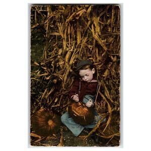 1909 Halloween Boy Carving Jack-O-Lantern Pumpkin Postcard Flint MI